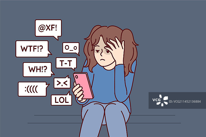 小女孩用手机遭受网络欺凌图片素材