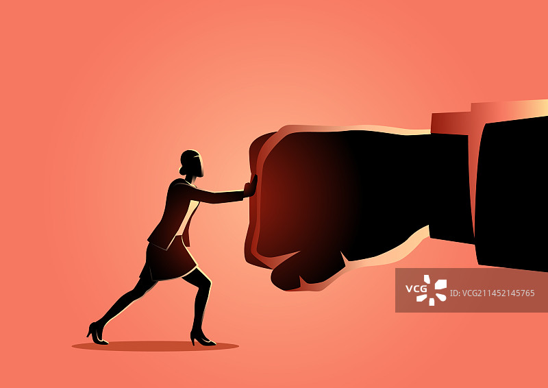 女商人举着巨大的拳头图片素材