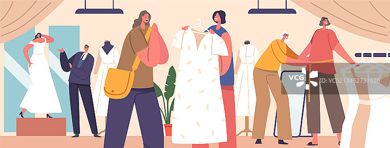女人在沙龙选择结婚礼服图片素材