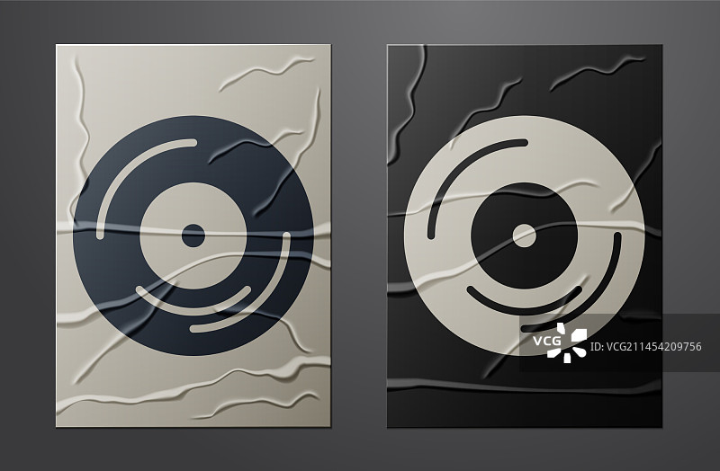 白色乙烯基光盘在皱纸上图片素材