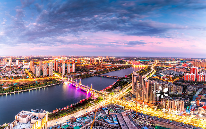 通州城市副中心运河上的彩虹桥夜景图片素材
