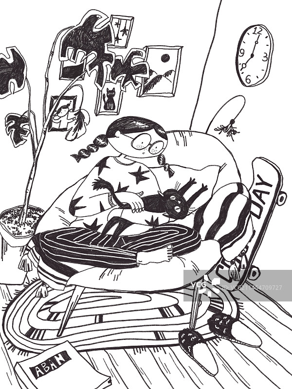 一个女孩儿坐在沙发上撸猫图片素材