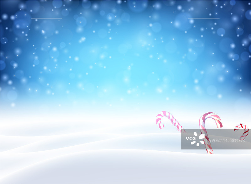 雪地背景上的圣诞节拐杖糖图片素材