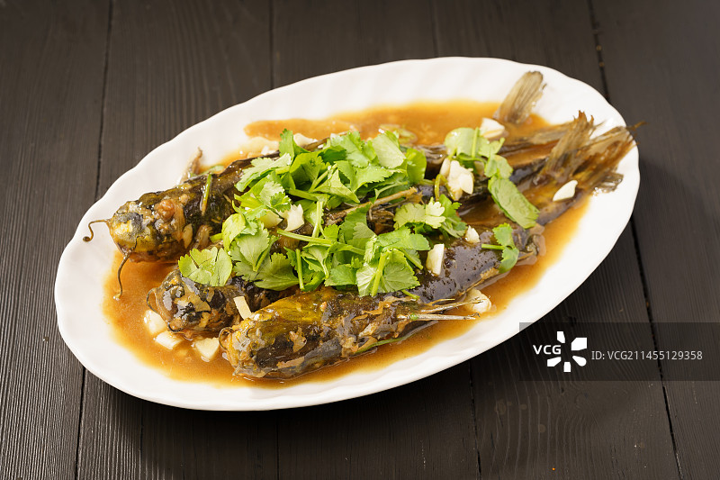 中国东北地方特色家常菜酱烧嘎牙鱼图片素材