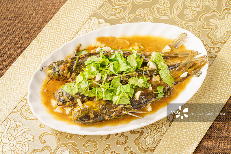 中国东北地方特色家常菜酱烧嘎牙鱼图片素材