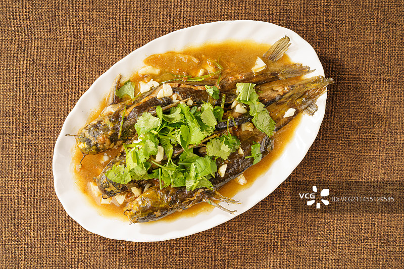 中国东北地方特色家常菜酱烧嘎牙鱼图片素材
