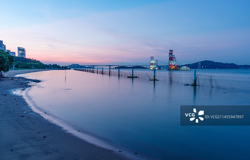 广州南沙滨海沙滩黄昏余晖风景长曝光图片素材
