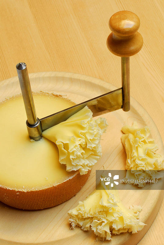 莫因头奶酪与旋转刀Girolle，奶酪玫瑰花图片素材