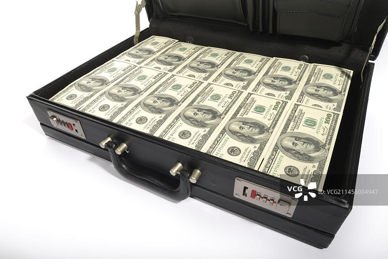 装满百元美钞的公文包图片素材
