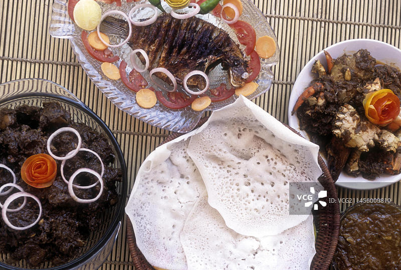 绿河鲹鱼苗、螃蟹肉汁、烤鸭和阿帕姆，印度喀拉拉邦图片素材