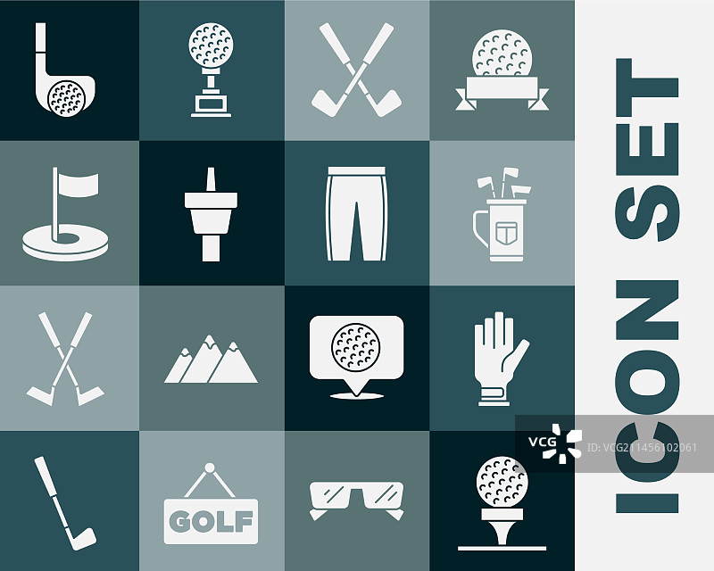 高尔夫球放在球座上手套和球杆包交叉放置图片素材