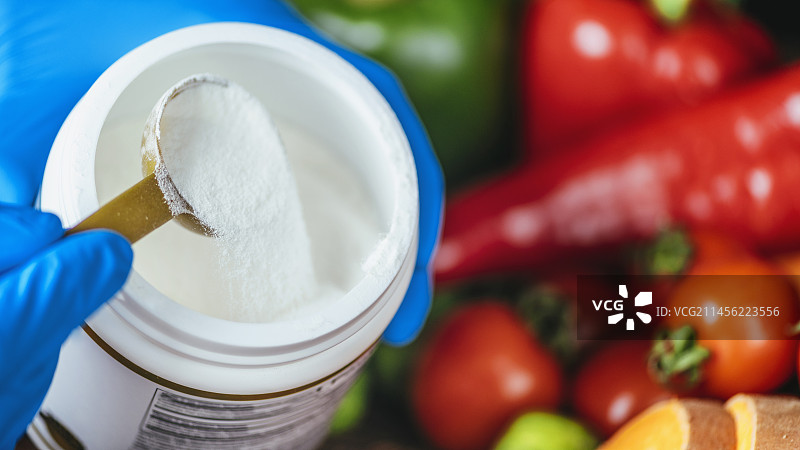 胶原蛋白补充剂粉末和蔬菜图片素材