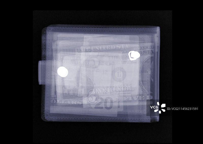 装满美元的钱包X光图片素材