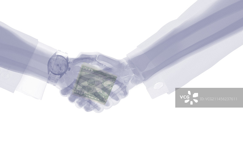 X光下的商人握手图片素材