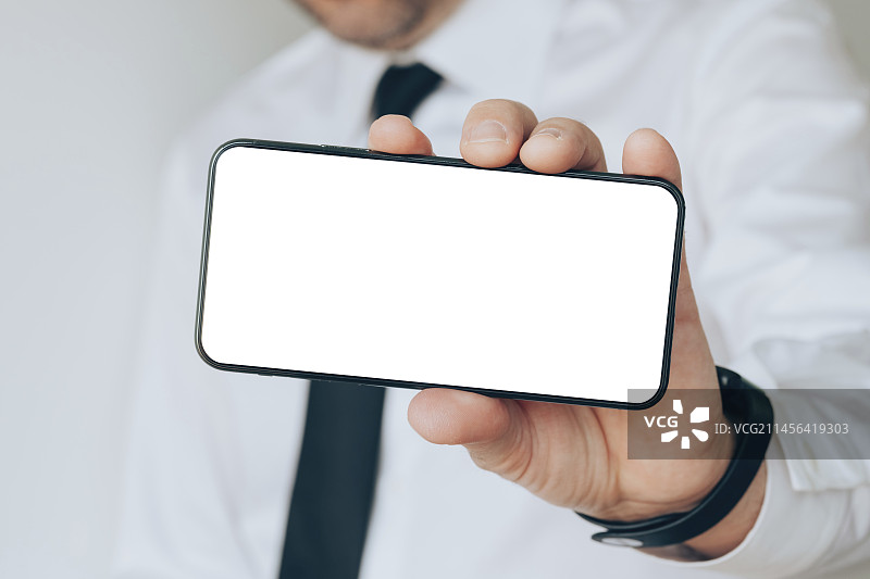 商人使用智能手机图片素材