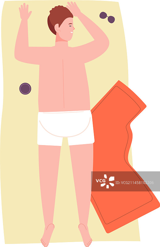 在沙滩巾上睡觉的男人俯视图图片素材