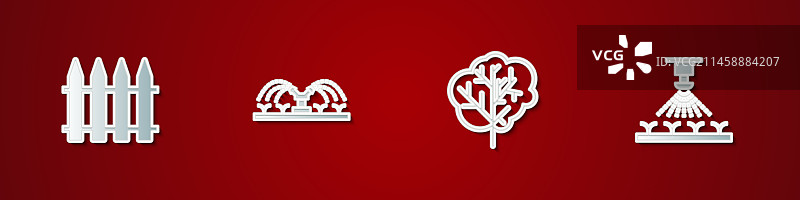 花园围栏和自动灌溉喷头图片素材