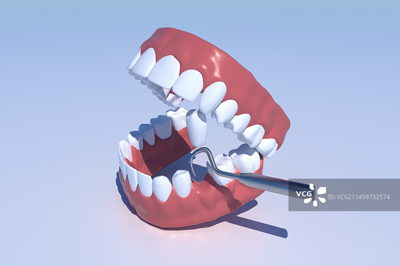 蓝色背景下假牙的特写镜头图片素材