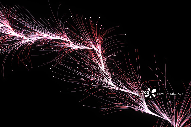 3D黑色背景下被照亮的火花的特写镜头图片素材