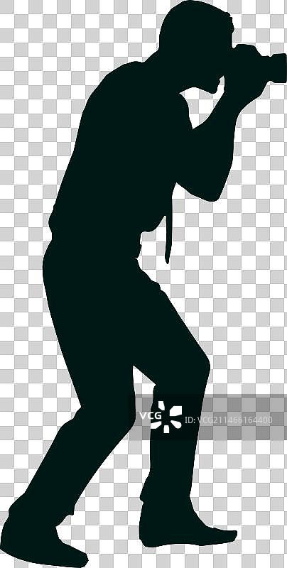 男子摄影师拍摄剪影图片素材