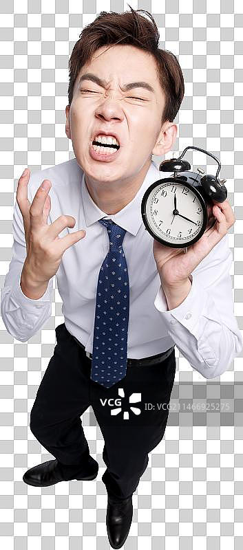 商务青年男人拿着闹钟图片素材