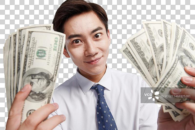商务青年男人拿着美元图片素材