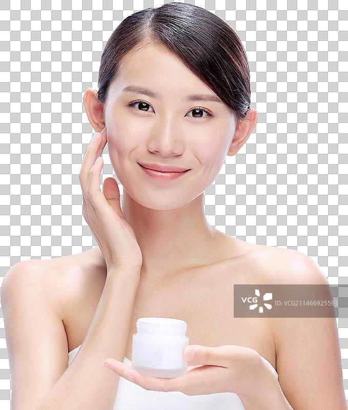 年轻美女拿着润肤霜图片素材