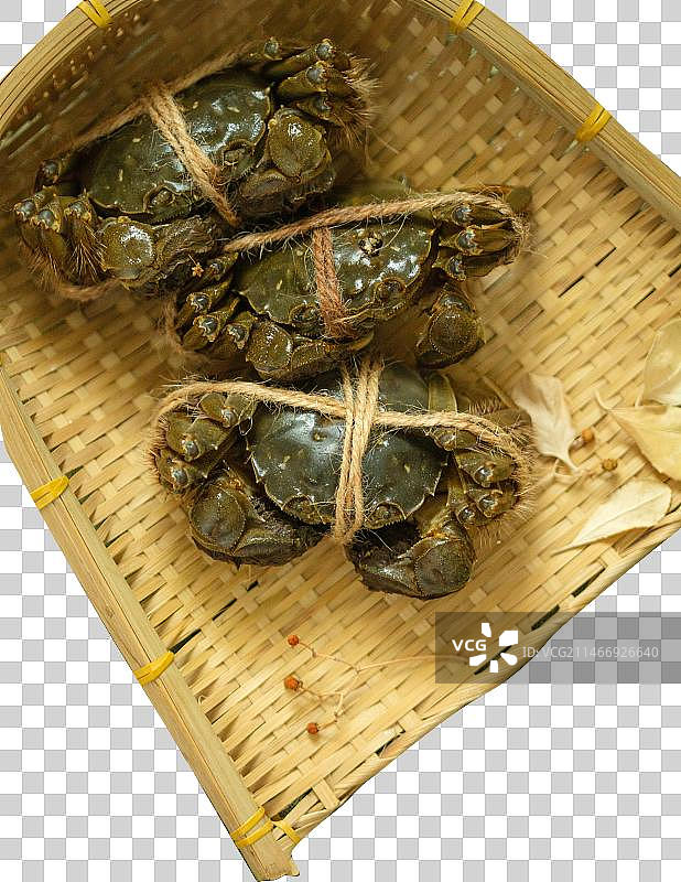 螃蟹放在簸箕里图片素材