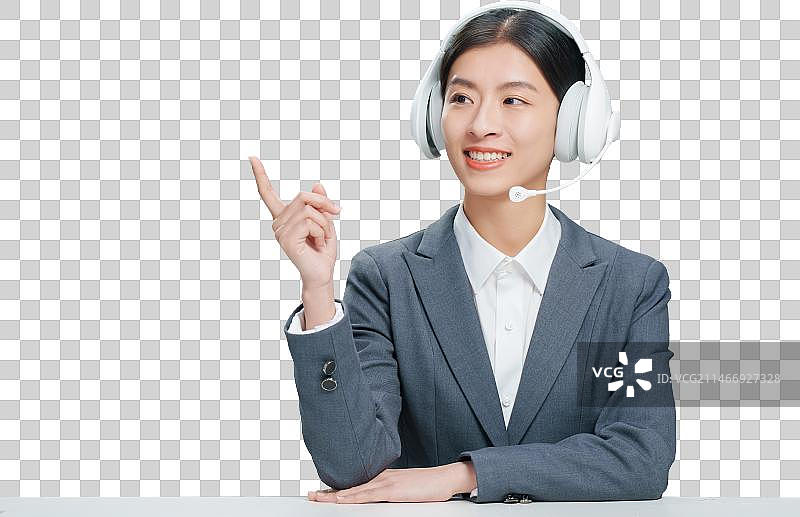 带着耳麦的青年女人图片素材