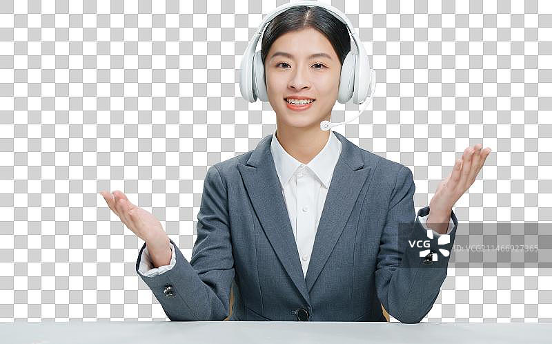 带着耳麦的青年女人图片素材