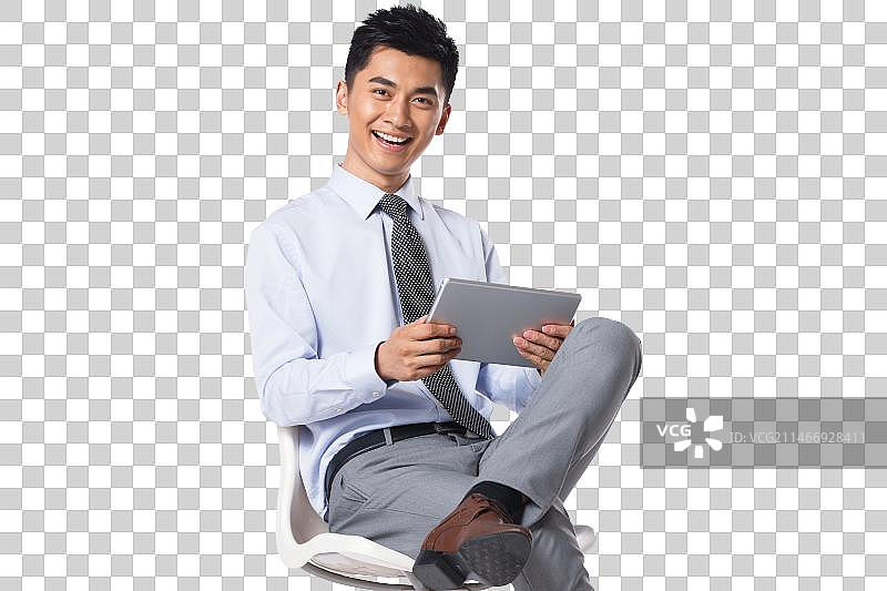 商务男士拿着平板电脑图片素材