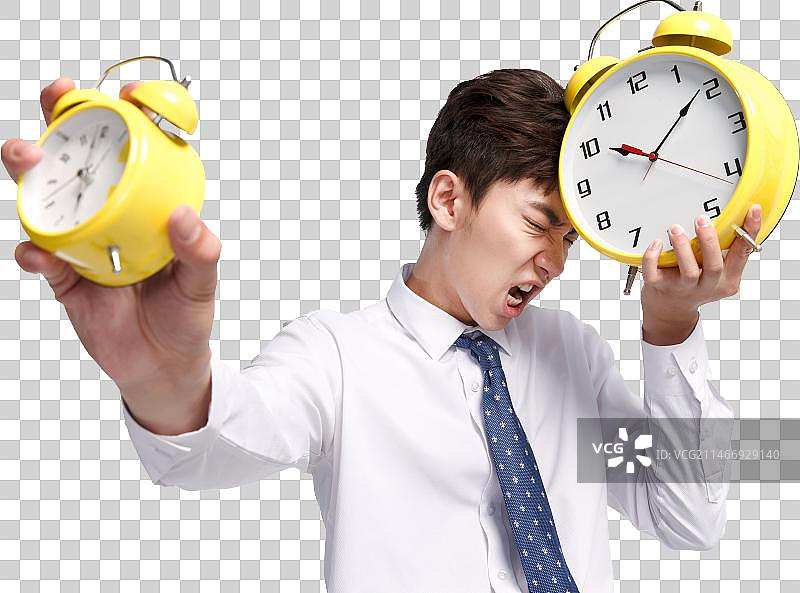 商务青年男人拿着闹钟图片素材