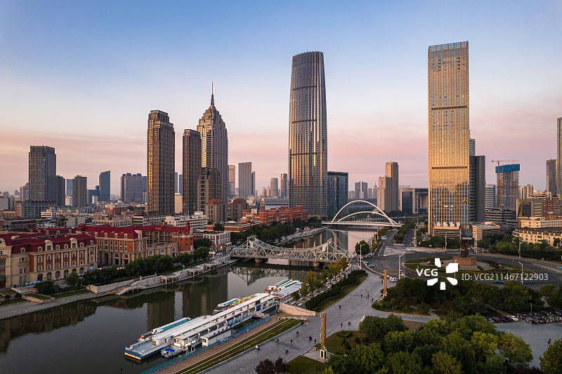 天津海河沿岸世纪钟广场城市建筑日出风光图片素材