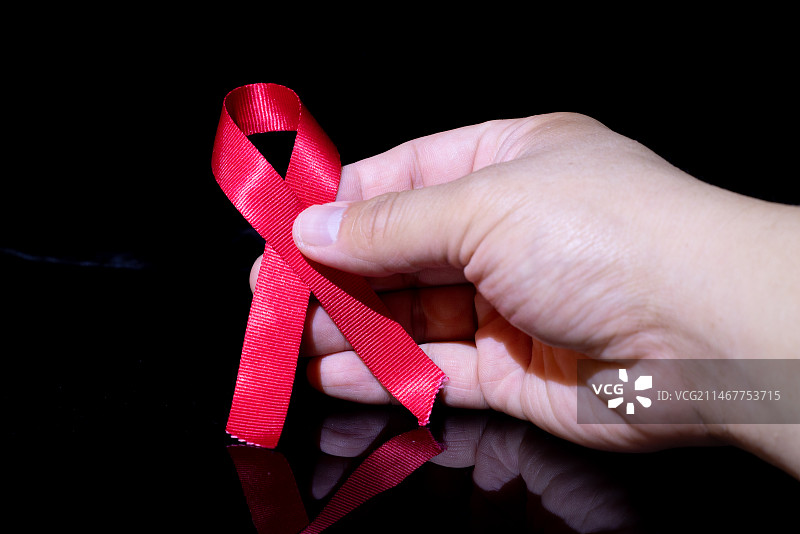 HIV艾滋病丝带，关爱艾滋病患者，提高艾滋病防范意识图片素材