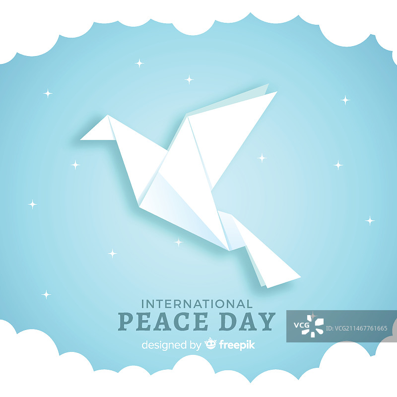 星星与云朵环绕的折纸鸽子图片素材