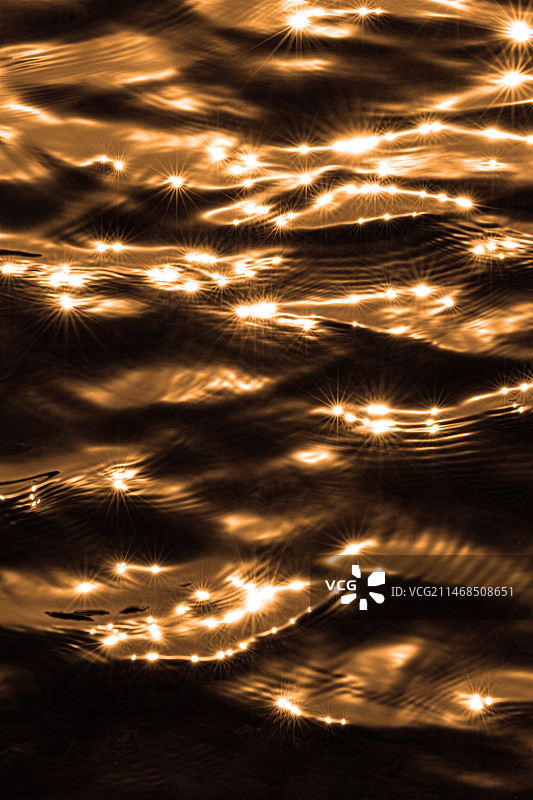 金色的水波纹星光星芒图片素材