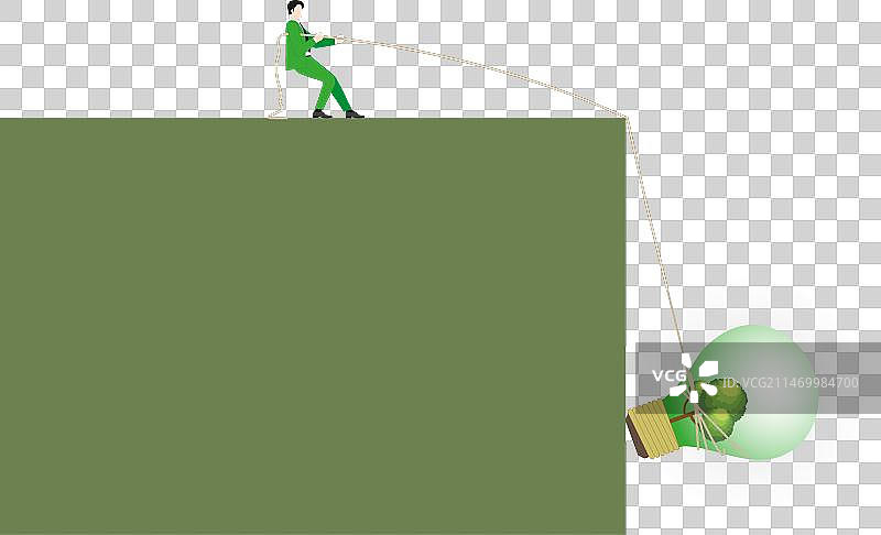 一位商人拉动绳子点亮大灯泡图片素材