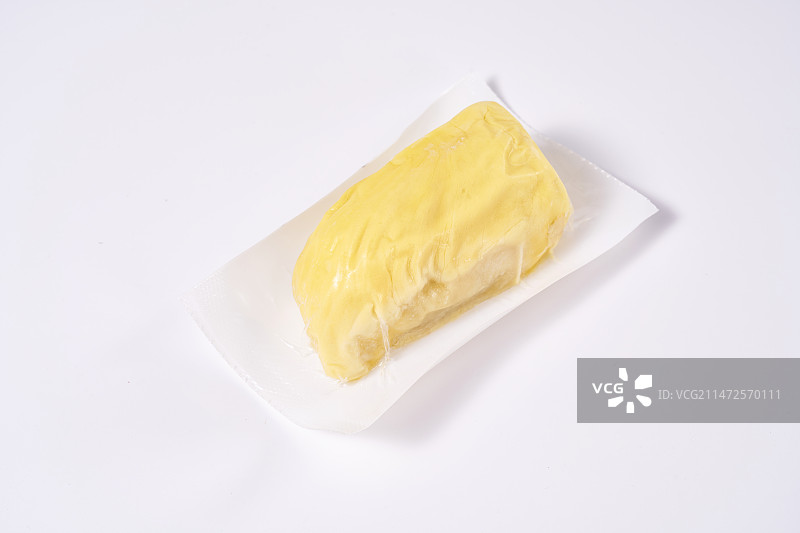 热带水果金枕榴莲白色背景下盘子中食物的高角度视图图片素材