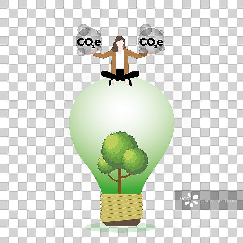 女商人坐在树旁，手持二氧化碳气体图片素材