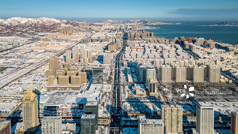 航拍冬季大雪海景城市风光图片素材