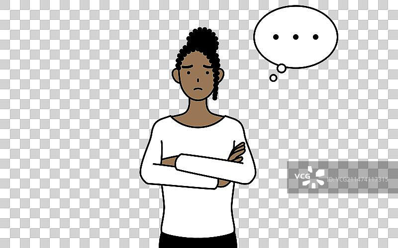 深思熟虑的非裔美国妇女，双臂交叉图片素材