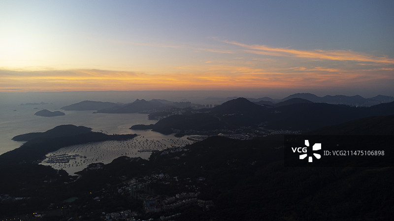 香港麦理浩径昂坪营地日出时分图片素材