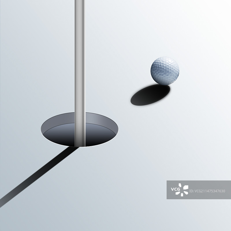 球洞附近的高尔夫球图片素材