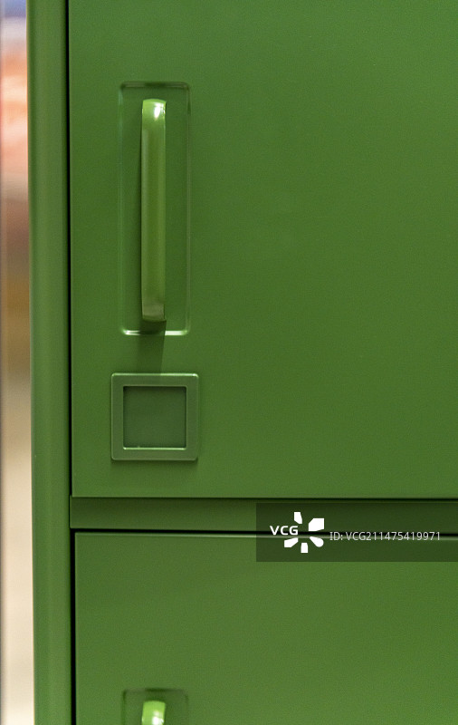 绿色金属办公柜子把手图片素材