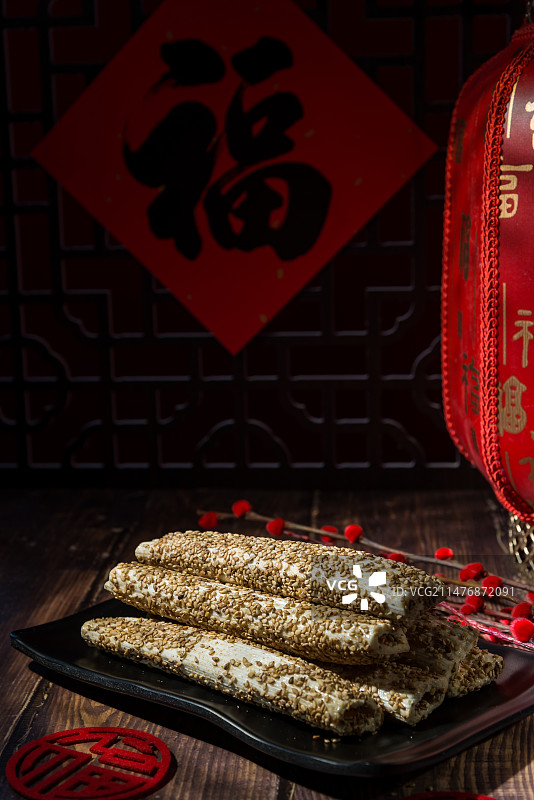 腊月二十三小年传统美食糖瓜糖棍麦芽糖图片素材