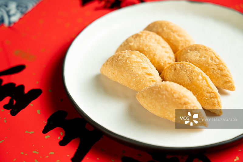 广东传统贺年食品 新年美食 春节传统美食 炸酥角 炸油角  特写 静物 棚景图片素材