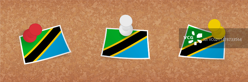 软木板上固定的三个版本的坦桑尼亚国旗图片素材