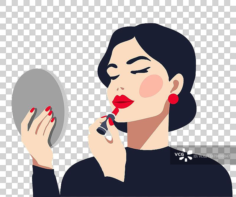 照镜子时涂口红的女人图片素材