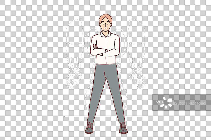 身穿外骨骼机器人的商人站立图片素材