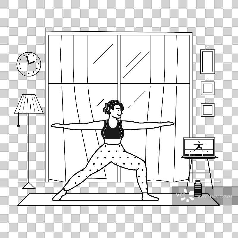 年轻女人用笔记本电脑在线练习瑜伽图片素材